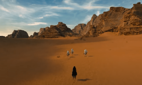 One of the opening scenes of John Wick: Chapter 4 showing a horse chase through the Wadi Rum desert